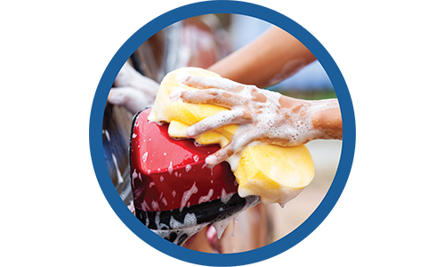 a person washing a car